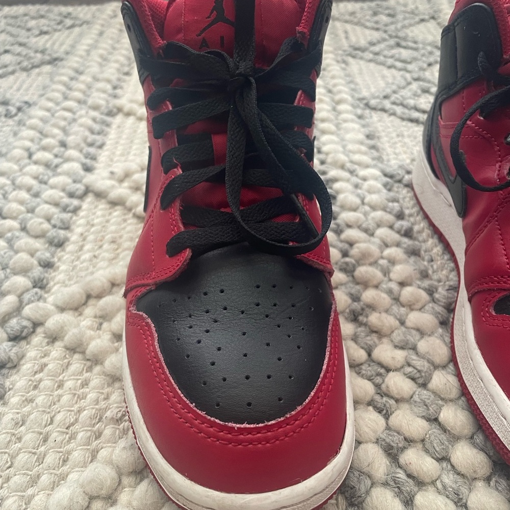 Nike Red and Black High-Top Sneakers with Perforated Toe Box